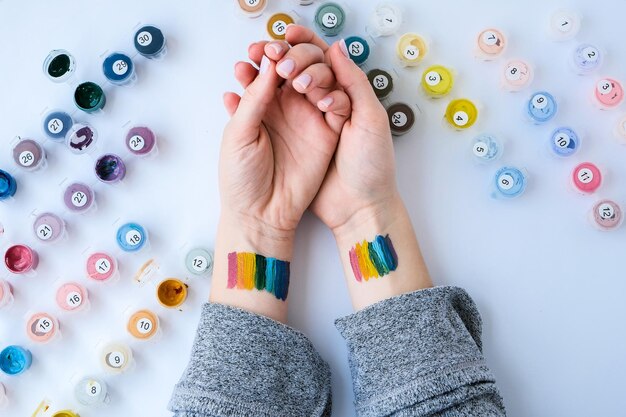 hands holding embroidered cloth
